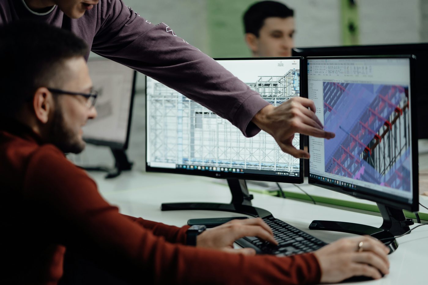 Two BIM specialists reviewing a structural model together